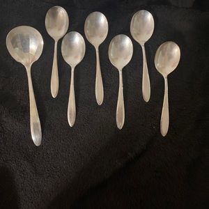 Sliver soup spoons and a ladle
